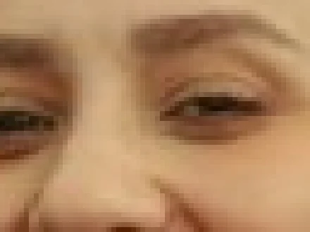 Eyes in the 800 × 600 photo, enlarged until the pixels show as blocks